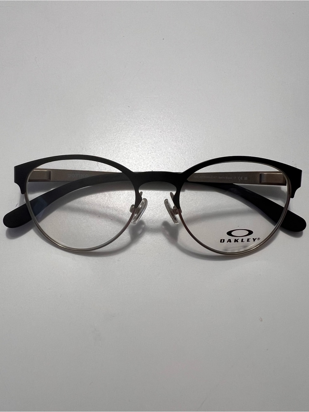 Oakley Round Metal Eyeglasses in Black and Silver